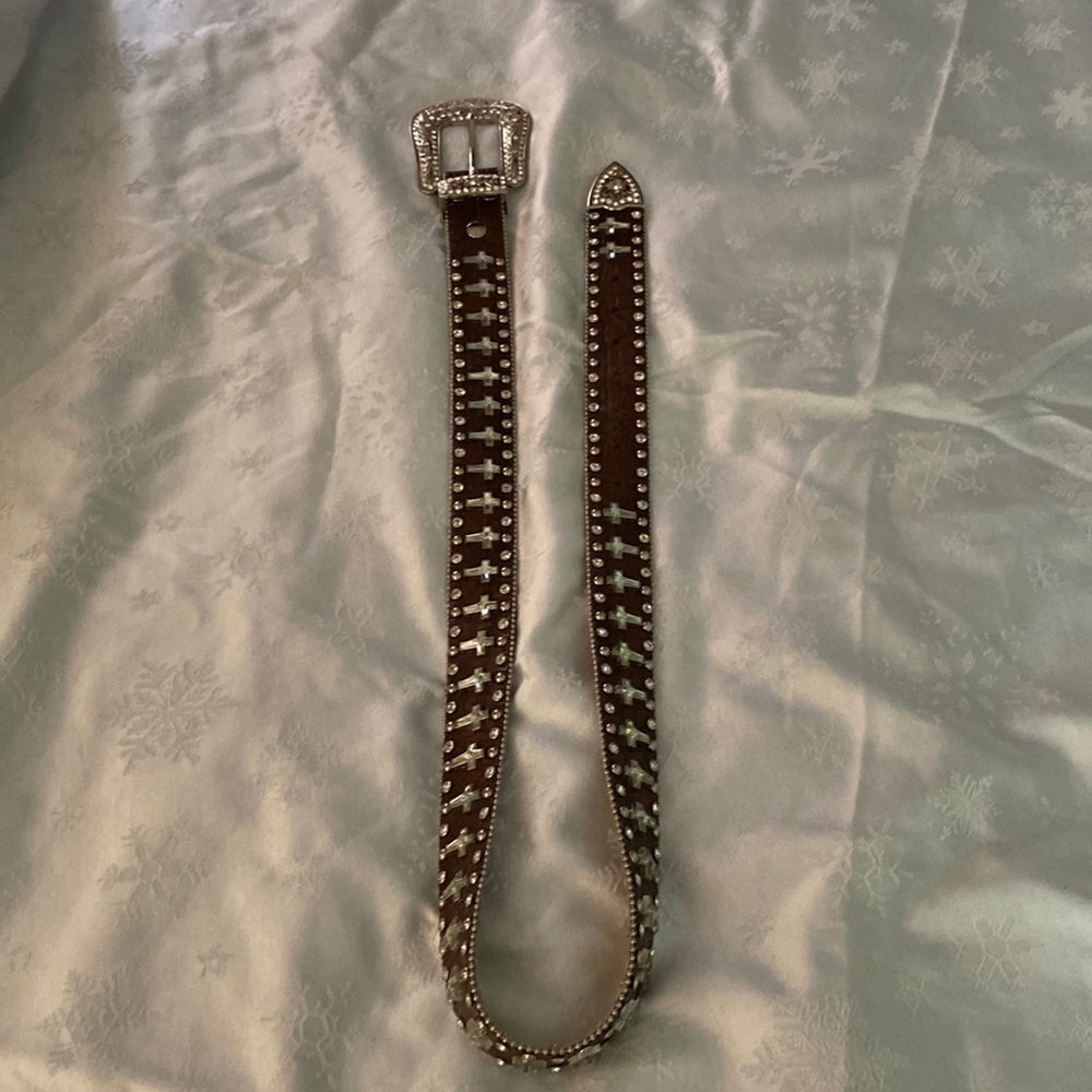 Really nice leather belt . Western style. Beautiful, I just never wear any more.